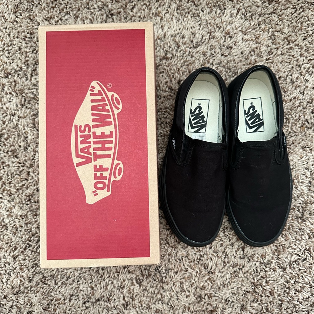Vans black classic slip on shoes
